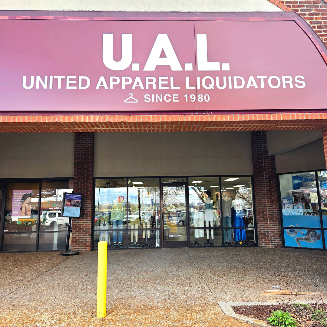 Storefront and window display of the Paddock Place UAL store location
