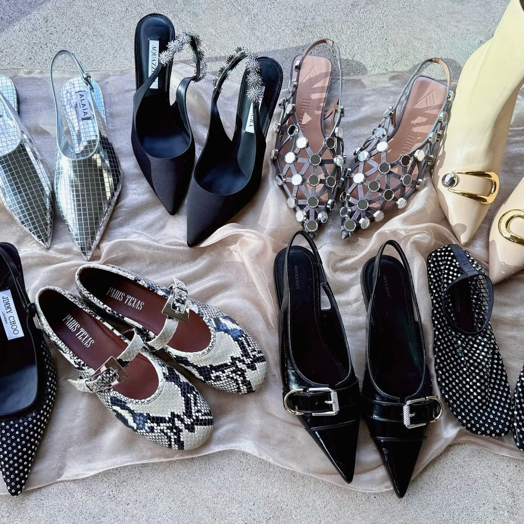 Looking down at an array of designer shoes from Jimmy Choo, Alaia and others