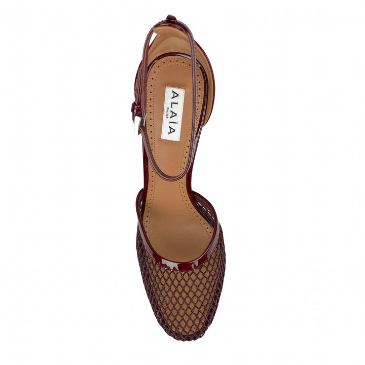 Alaïa Fishnet Patent Leather Pumps in Rouge