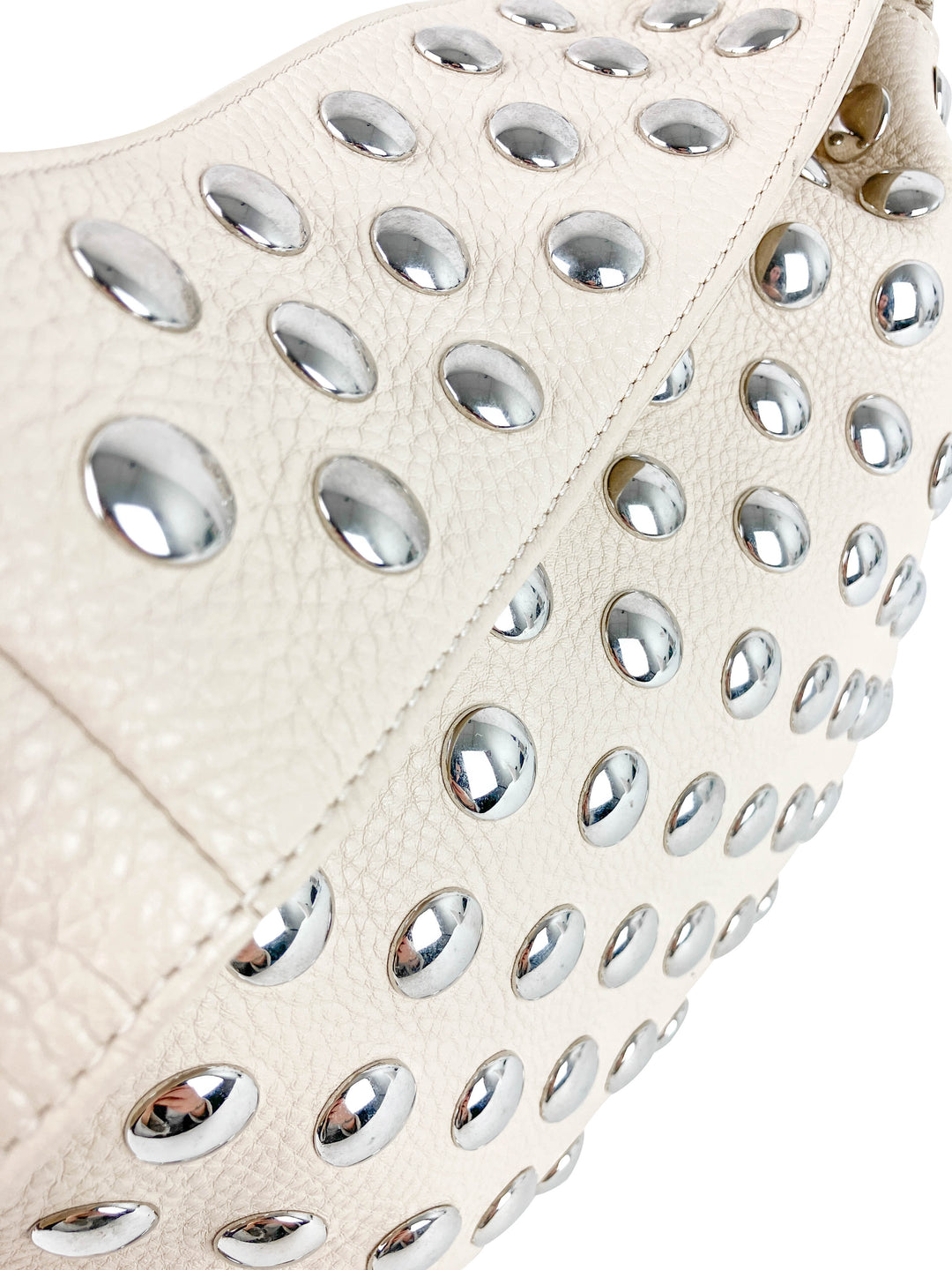 Khaite Studded Leather Shoulder Bag in Cream and Silver