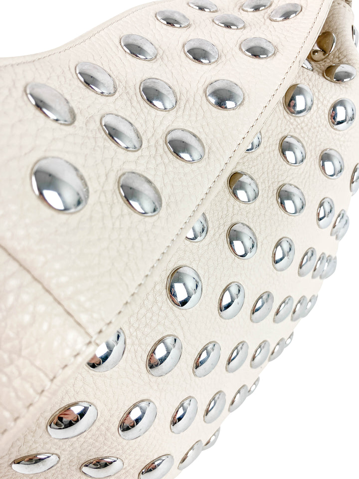 Khaite Studded Leather Shoulder Bag in Cream and Silver