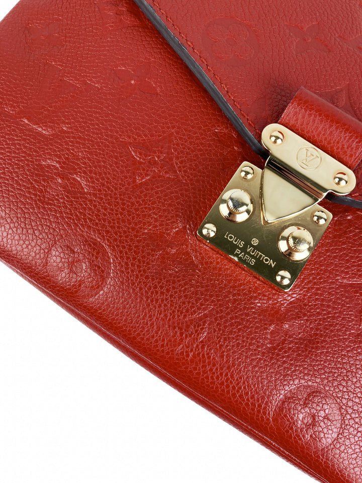 Louis Vuitton Pochette Métis Monogram Empreinte Leather Bag in Red