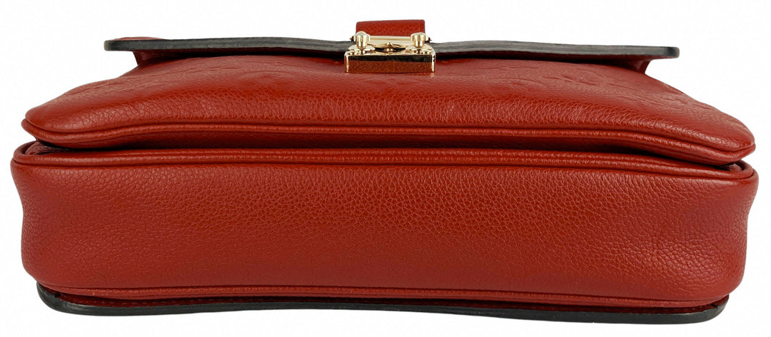 Louis Vuitton Pochette Métis Monogram Empreinte Leather Bag in Red