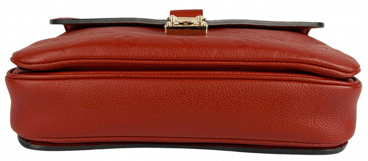 Louis Vuitton Pochette Métis Monogram Empreinte Leather Bag in Red