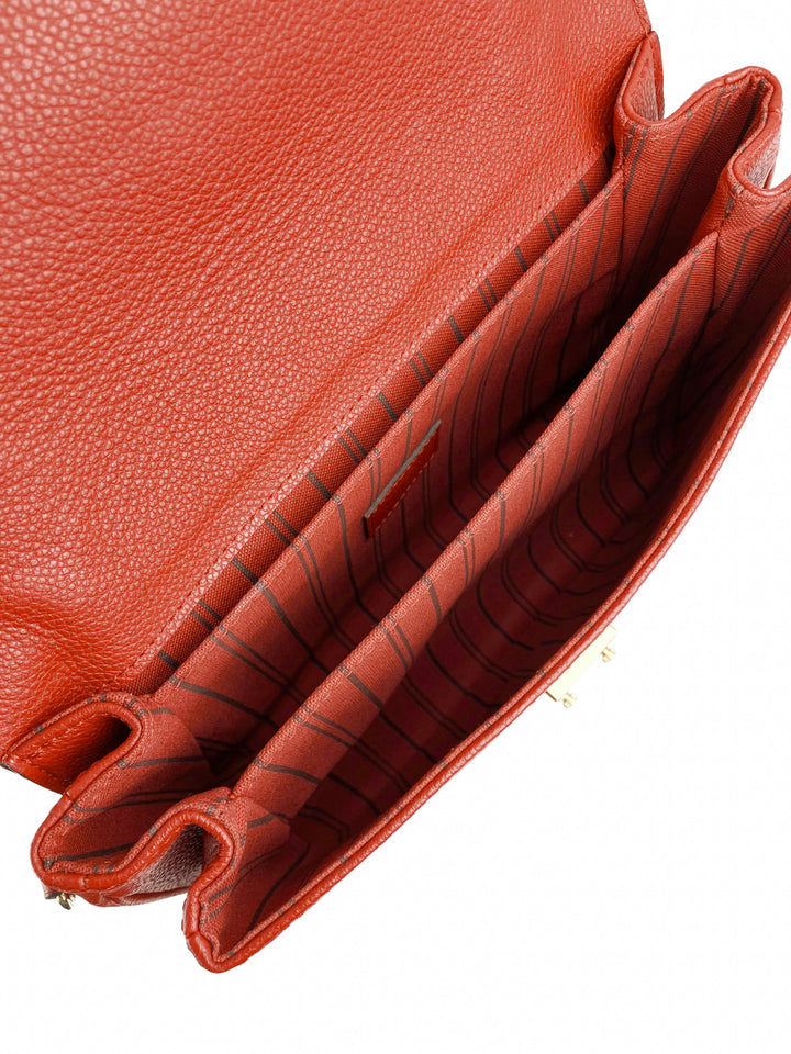 Louis Vuitton Pochette Métis Monogram Empreinte Leather Bag in Red